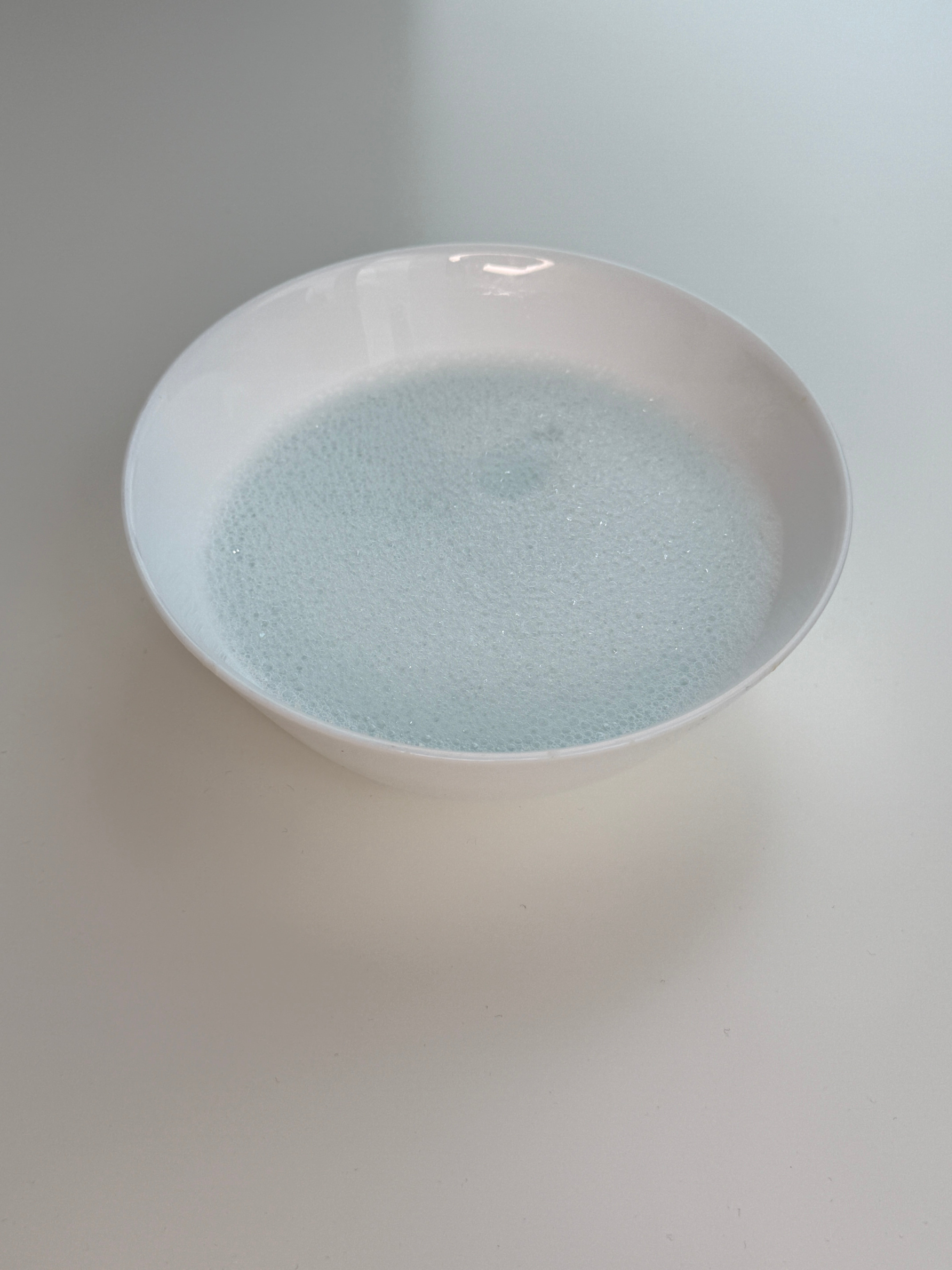 Soak nails in warm soapy water