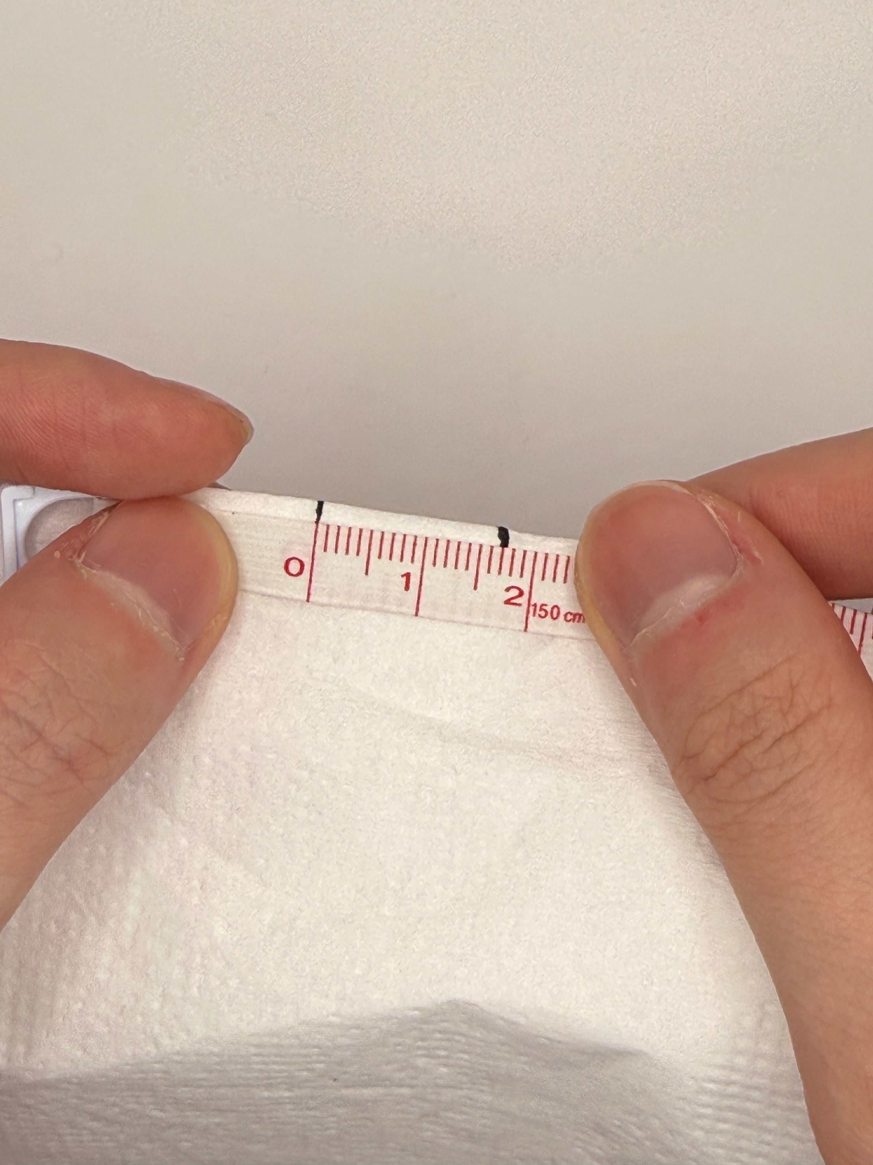 Measuring a nail with paper, step 3